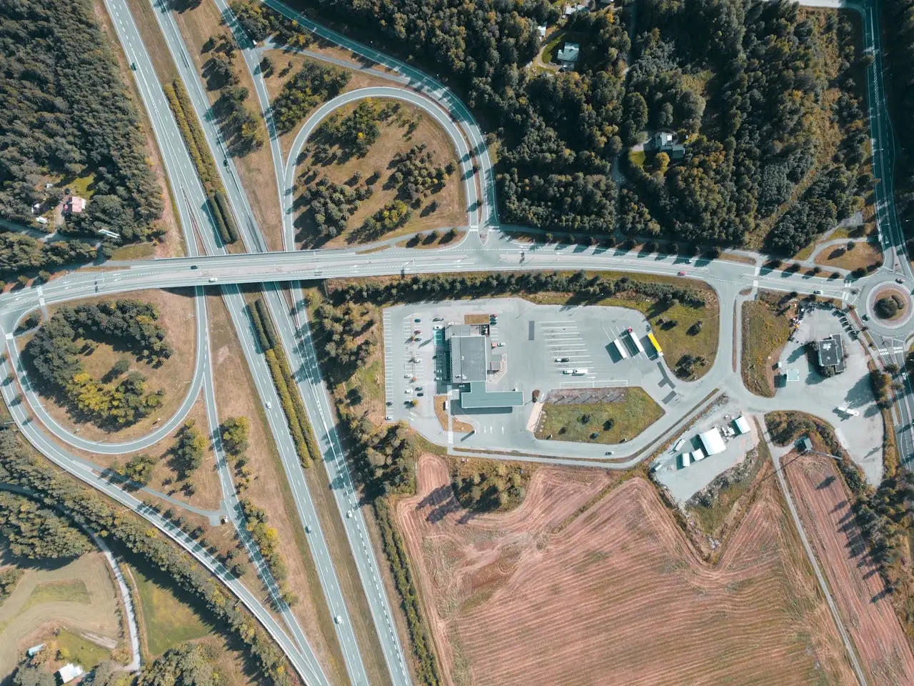 Aerial view of a highway intersection and countryside near Iittala, Suomi.